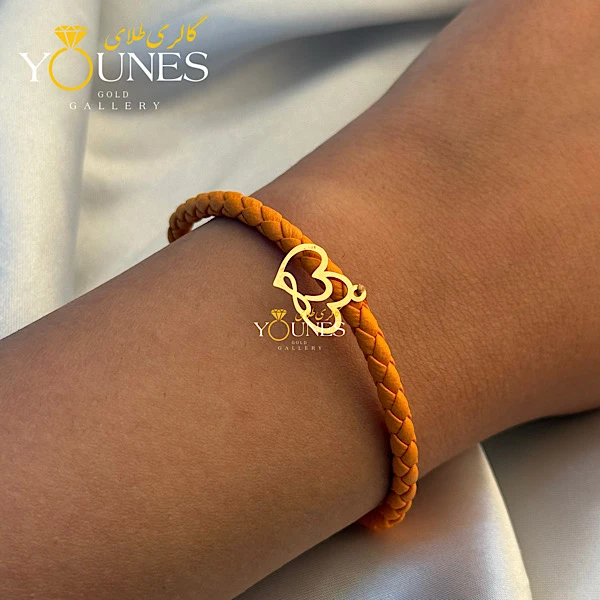 دستبند چرم نارنجی قلبی بینهایت طلا